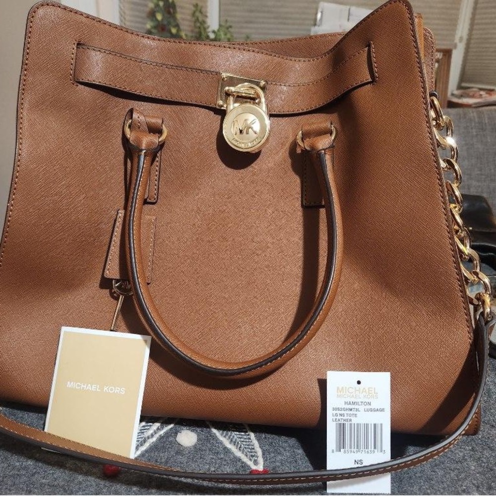 New with tags never used Michael Kors purse